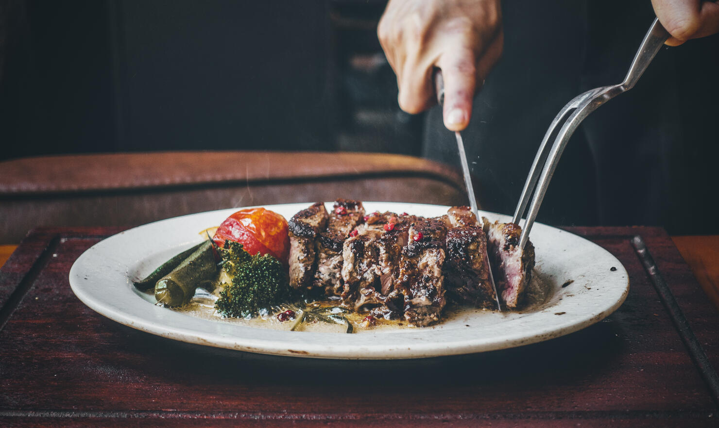 cutting the steak