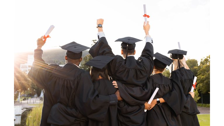 Graduation, group and back view of students celebrate education success. Behind of excited graduates at campus celebration for study goals, university award and learning motivation for happy future