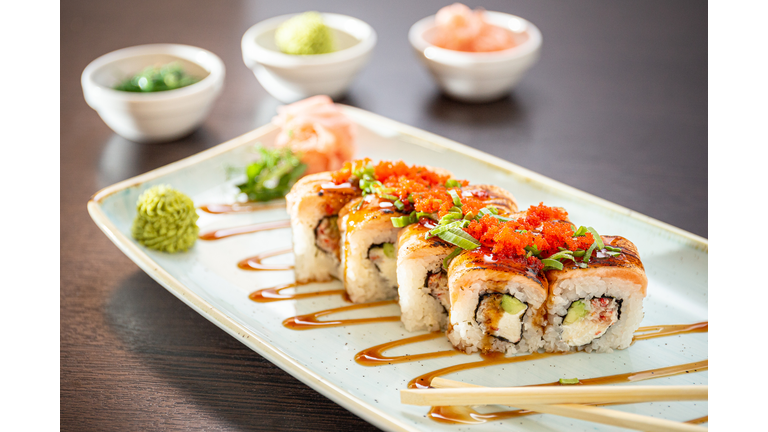Sushi maki with salmon, shrimp, cucumber