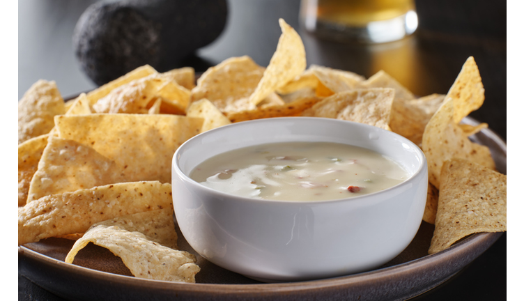 mexican hot queso blanco cheese dip with corn tortilla chips