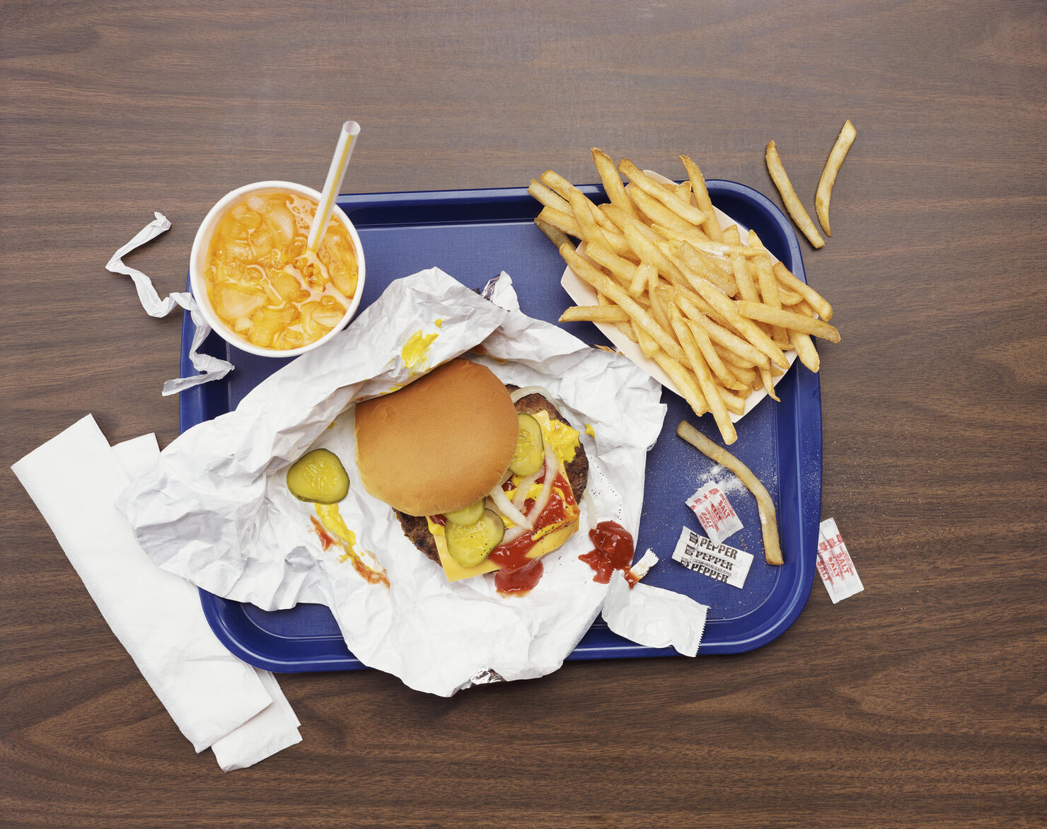 Elevated View of a Tray With Fries, a Hamburger and Lemonade