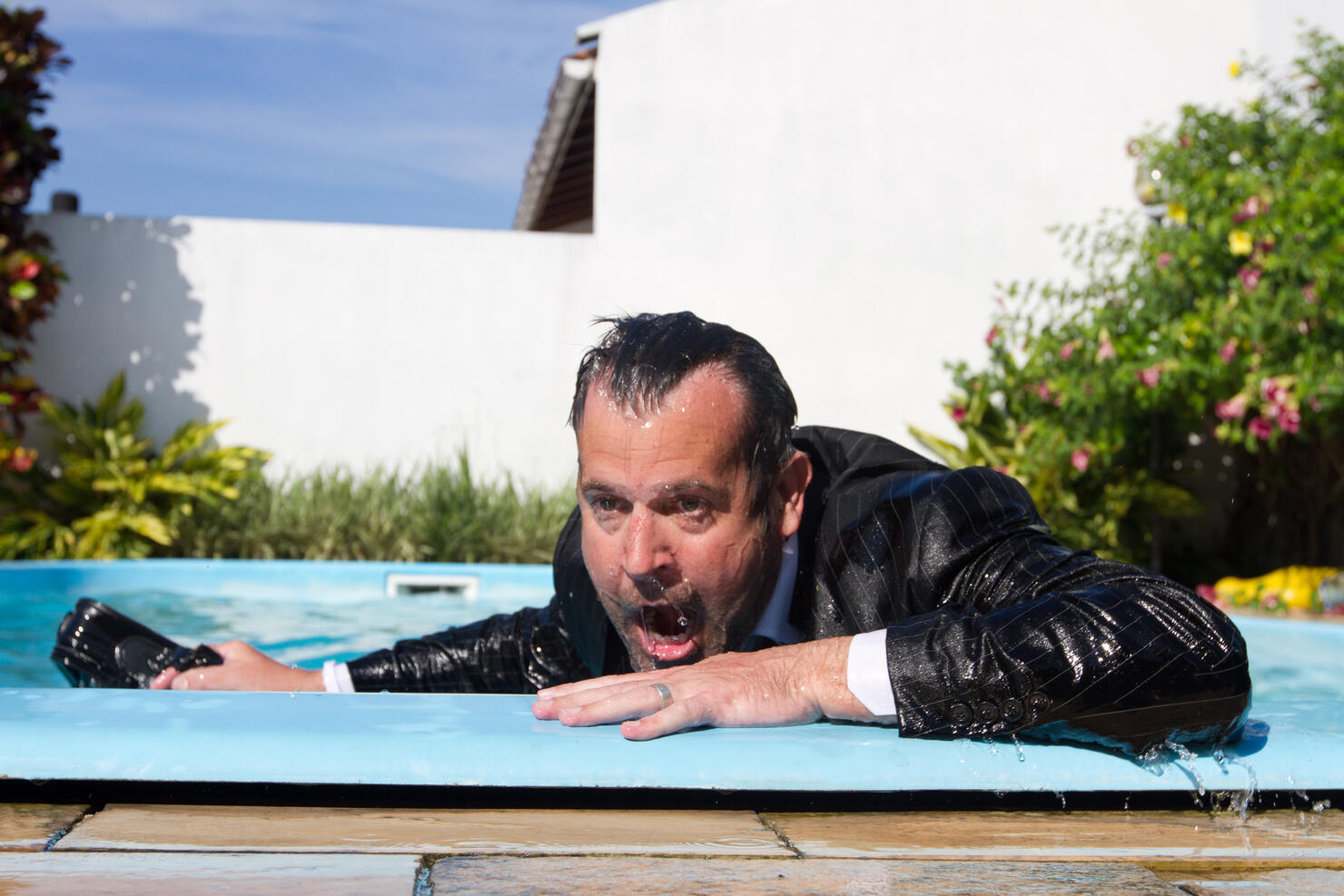 Soaking wet businessman