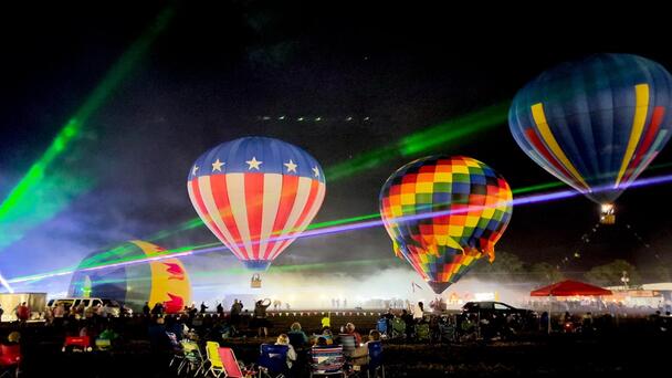 Win the family tickets to the Balloon Glow and Laser Show!