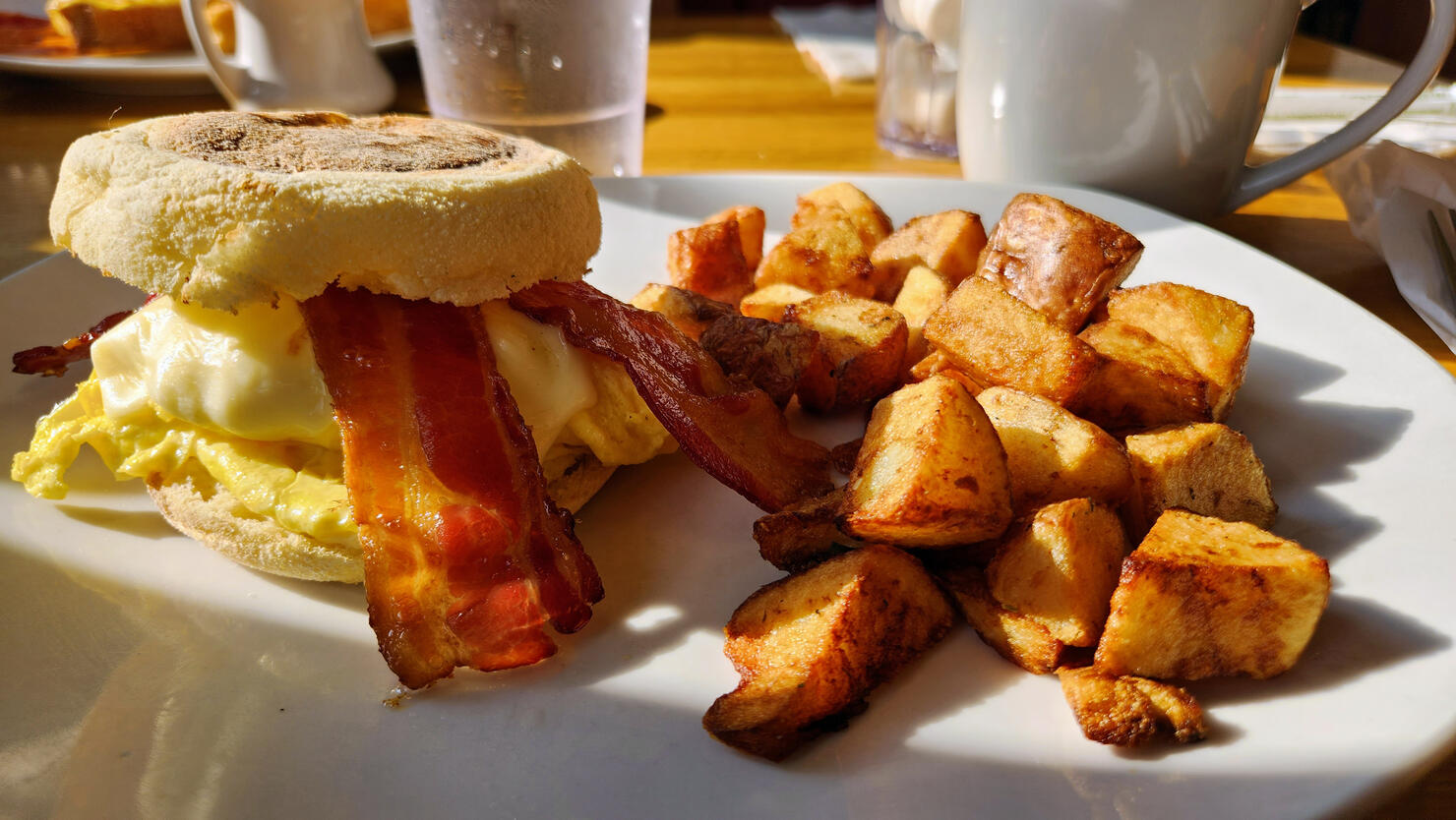 Breakfast sandwich with fried potatoes