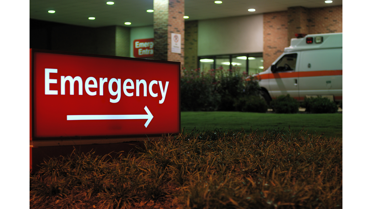 Emergency room entrance sign with ambulance