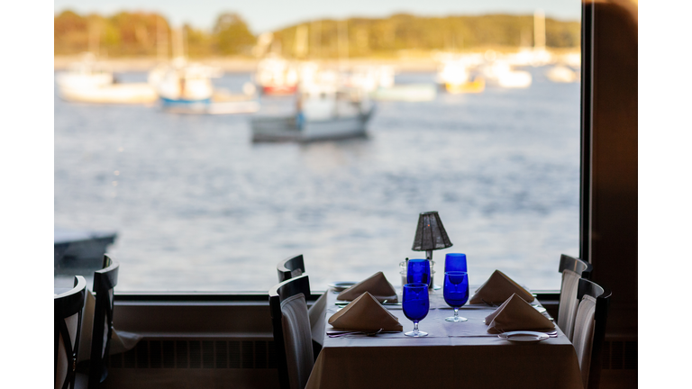 Blue glasses on a seaside table