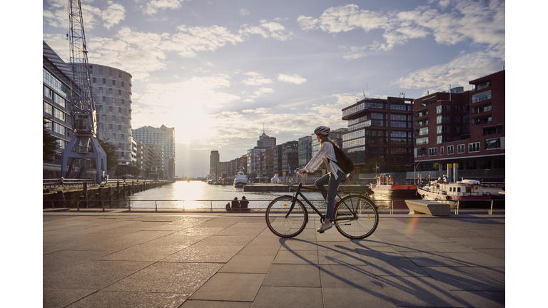 Young woman riding a bike
