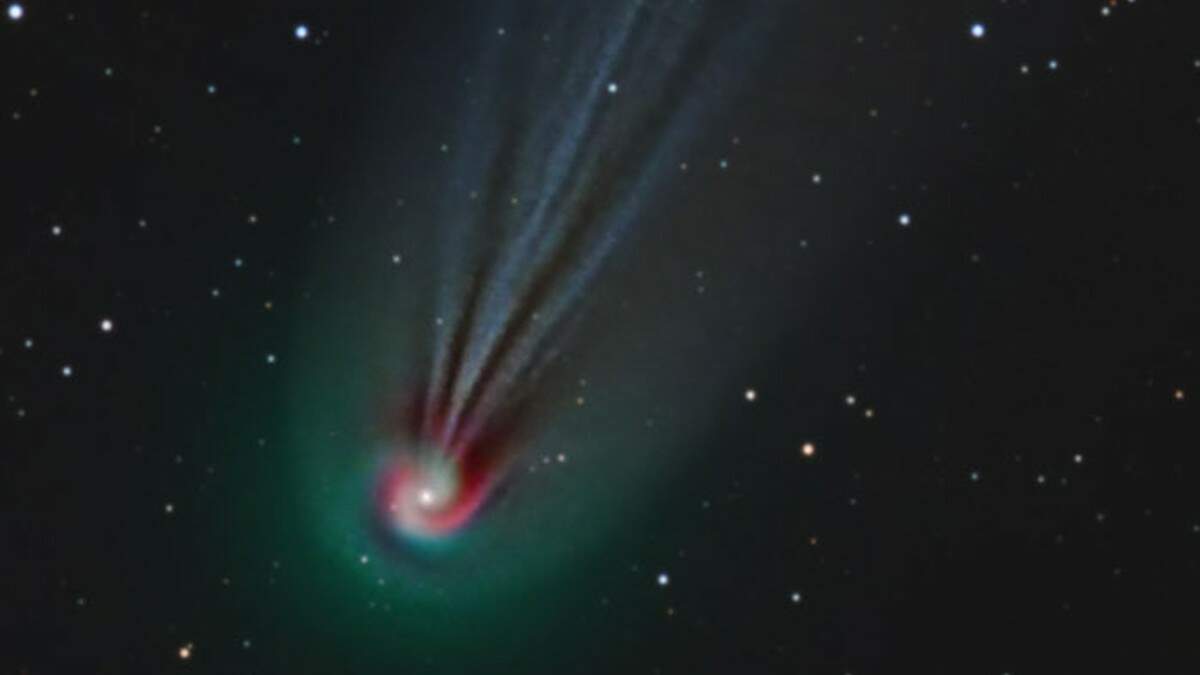 Watch the exploding green 'devil comet' zoom past the Andromeda