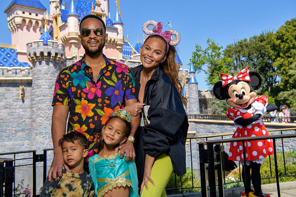 Chrissy Teigen And John Legend Visit Disneyland Resort in Anaheim, California
