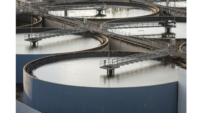 Sludge treatment pool and storage tanks
