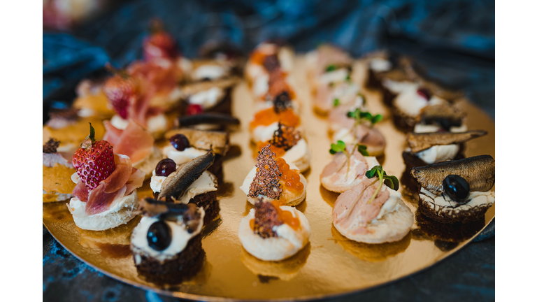 Mix Of Luxury Gourment Canapes With Herring,Cream,Fish Eggs And Prosciutto,Romania