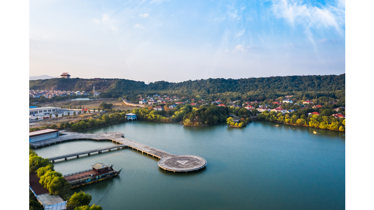 Longxi Lake scenic area, villas in the distance, helipad in the center of the lake. Jiangyin City, Jiangsu Province, China.