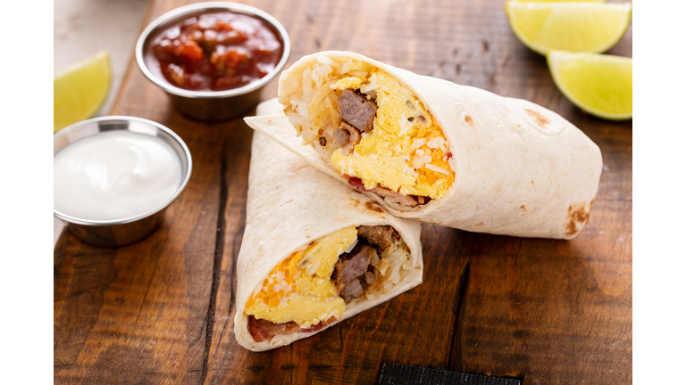 Breakfast burrito with sausage, eggs, hashbrown and cheese