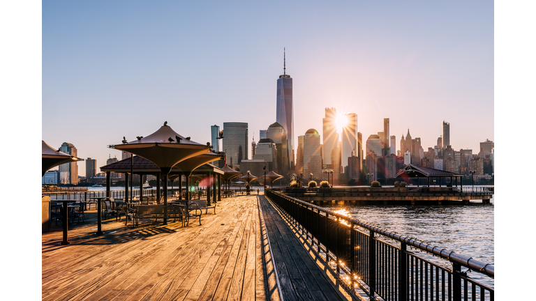 Sunrise in New York City seen from the pier in Jersey City, USA