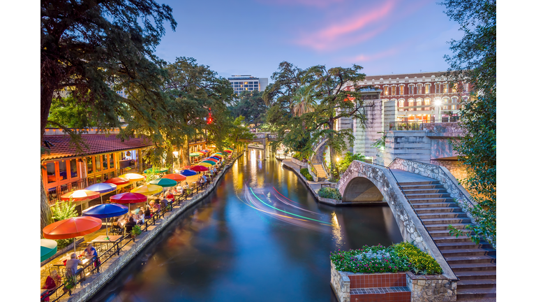 River walk in San Antonio city downtown skyline cityscape of Texas USA
