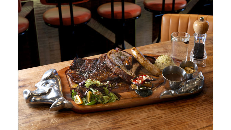 Various grilled pork chop ,steak , sausage tapas
