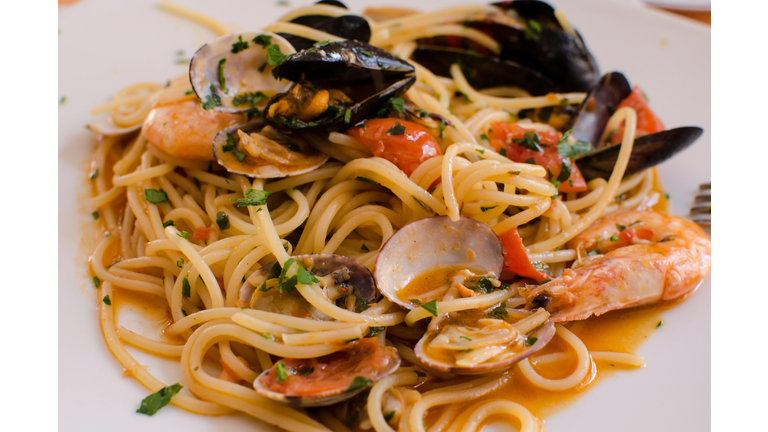 Spaghetti with typical Italian food seafood