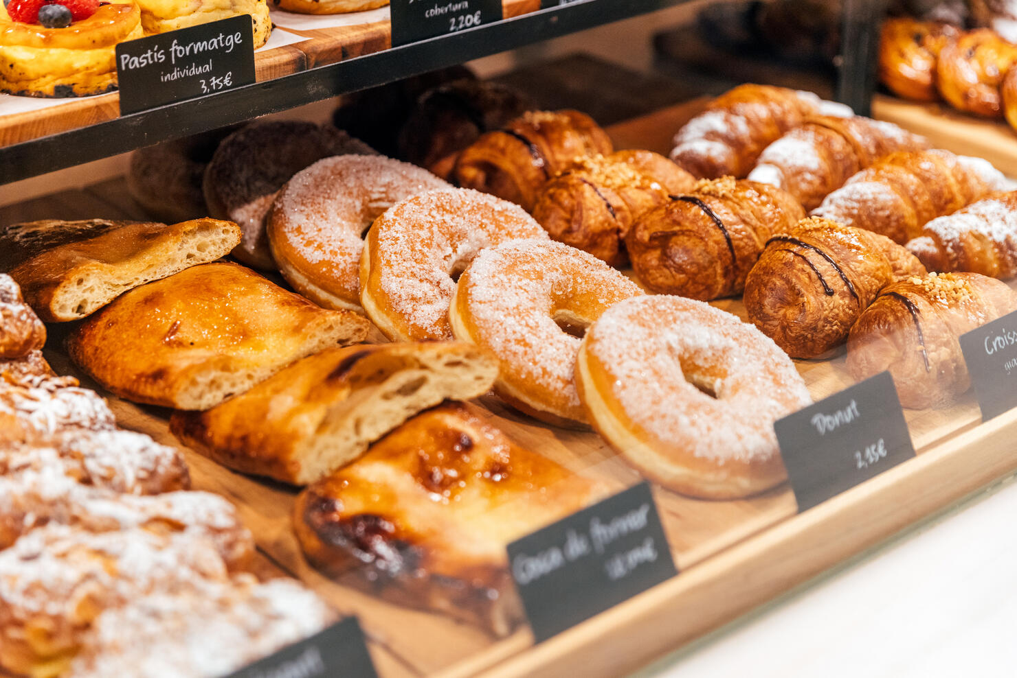 Fresh sweet pastry on a display in bakery