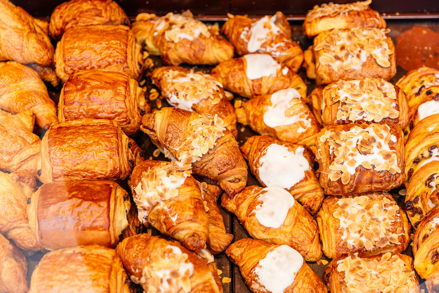 Fresh pastries at the bakery display for sale at French bakery