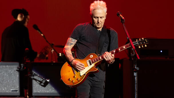 Watch Pearl Jam's Mike McCready Fall Off Stage, Continue To Play Guitar