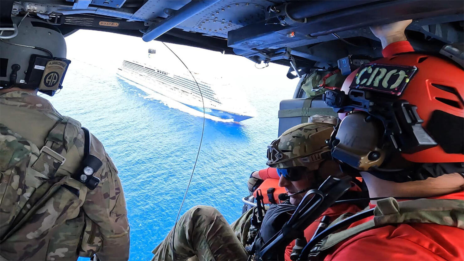 Members of the 920th Rescue Wing preparing to rescue a sick a cruise ship passenger.