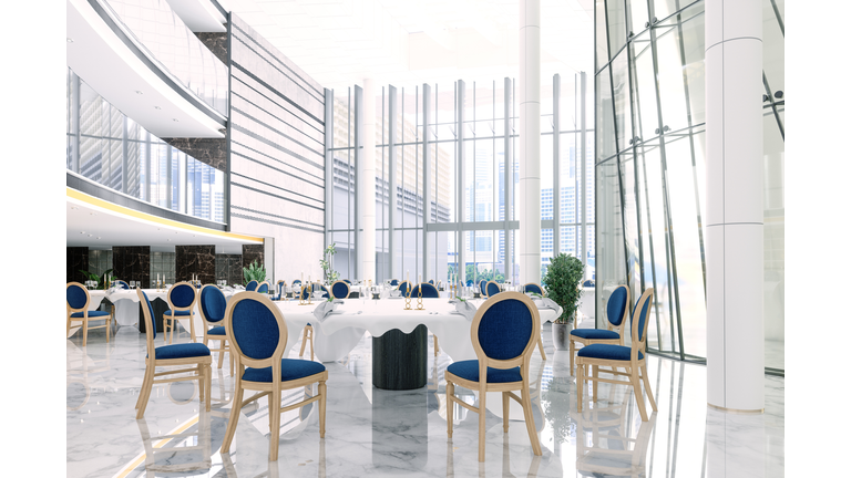 Interior Of A Banquet Hall In A Hotel Or In A Luxury Restaurant With Round Tables And Navy Blue Chairs.