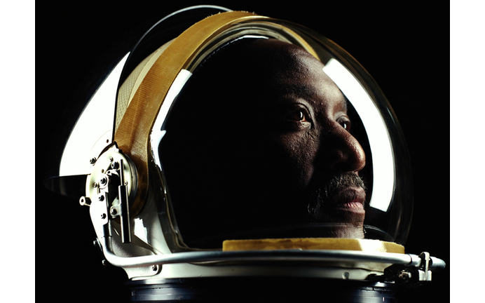 Man wearing astronaut helmet, close-up