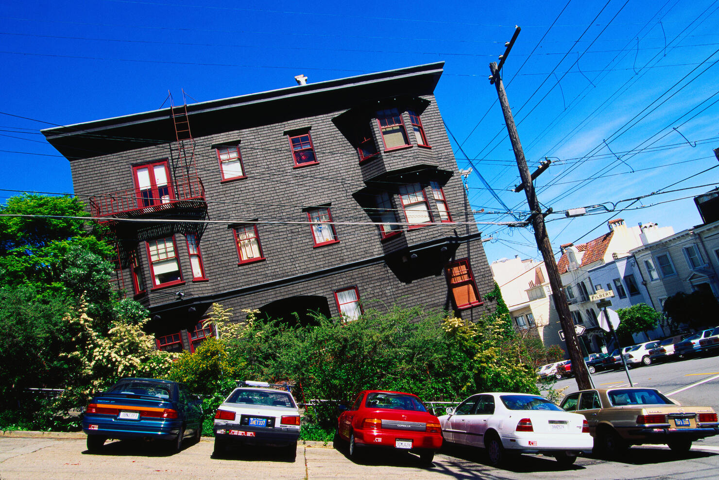 Cars parked outside a house on Filbert Street, the steepest street in San Francisco.