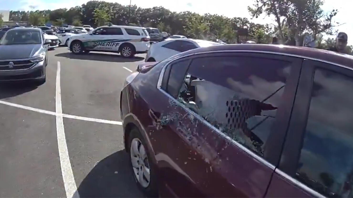 Florida deputy smashes window to save child