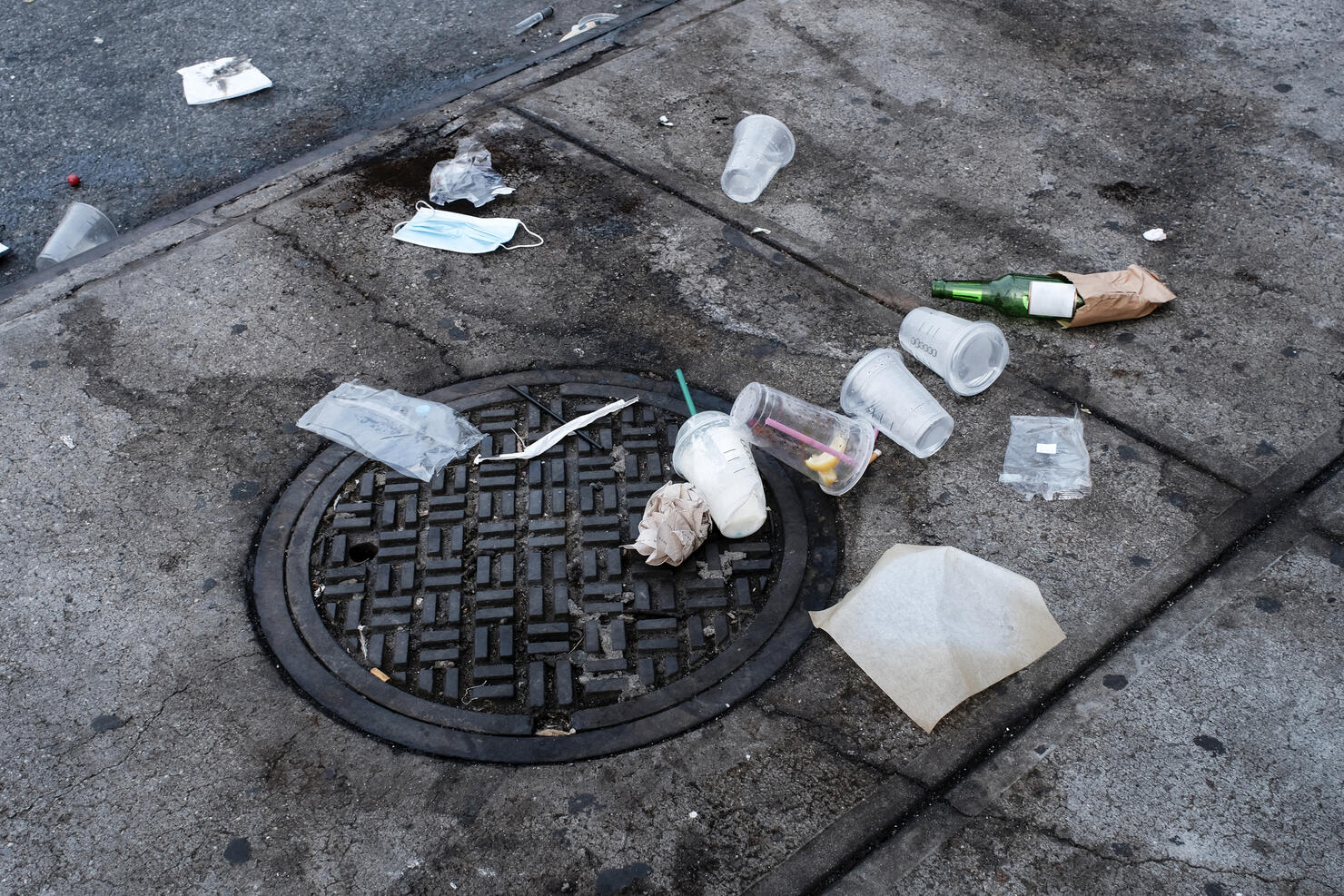 Garbage objects left on floor in public space
