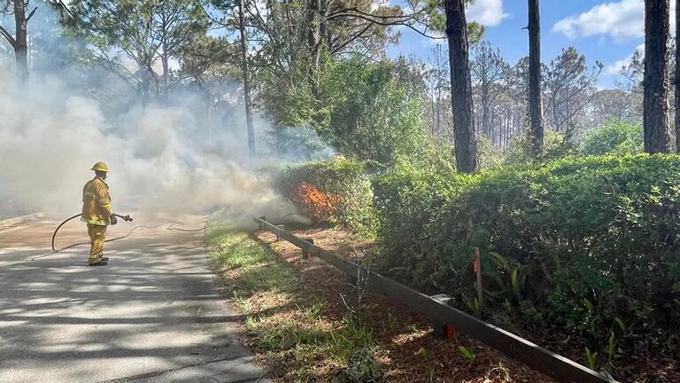 Firefighter Puts Out Martin County Brush Fire
