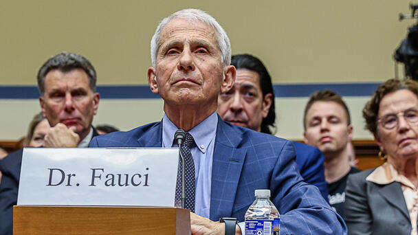 Man Who Sat Behind Dr. Fauci Making Faces During House Hearing Identified