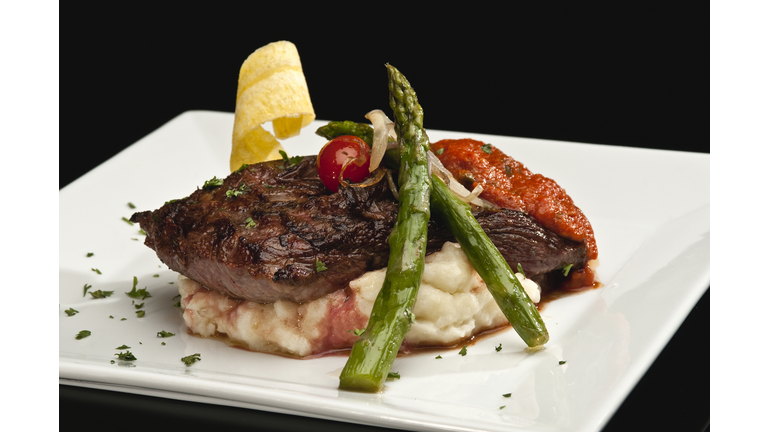 Sirloin steak with mashed potatoes and asparagus