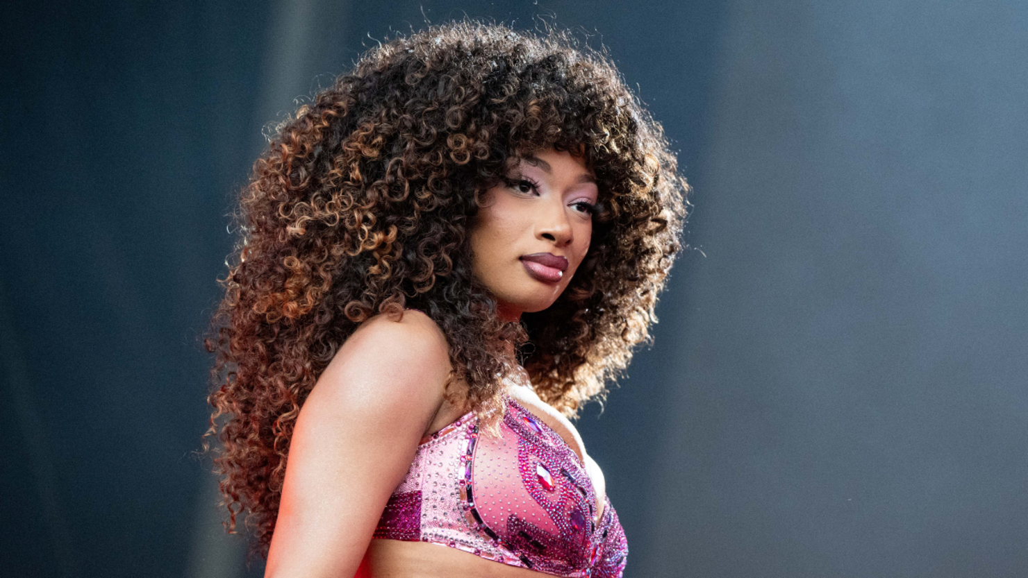 Megan Thee Stallion Holds Back Tears On Stage After AI Sex Tape Goes Viral  | iHeart