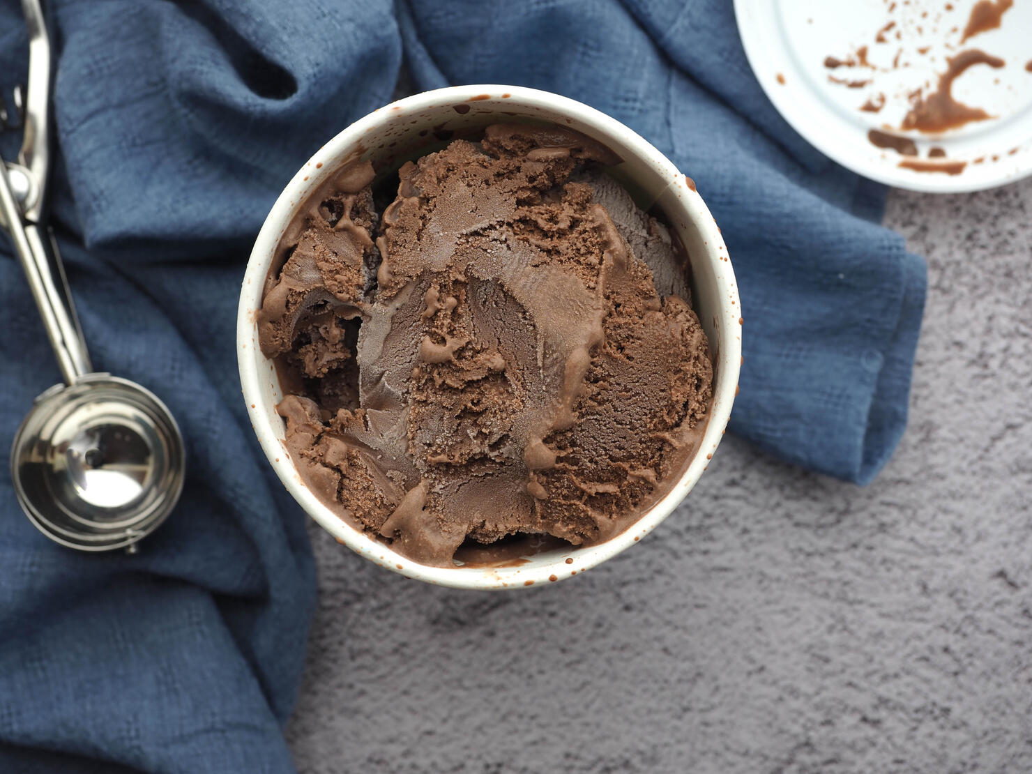 Chocolate ice cream in quart container at top view