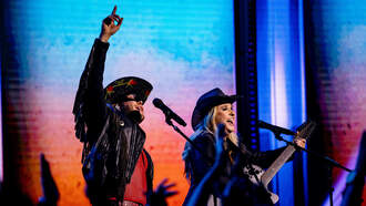 Melissa Etheridge Blends Genres With Country Artist Orville Peck On Stage