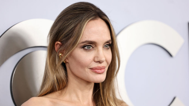 PHOTOS: Angelina Jolie Debuts 'Surprising' New Tattoo On Tony's Red Carpet