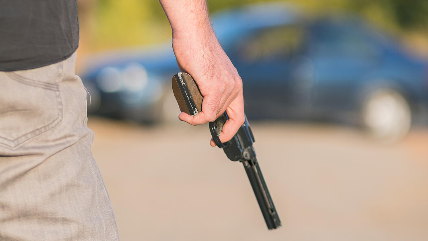 criminal with gun replica about to commit a crime