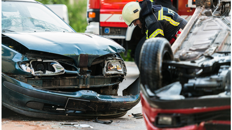 Firefighters At A Car Accident Scene