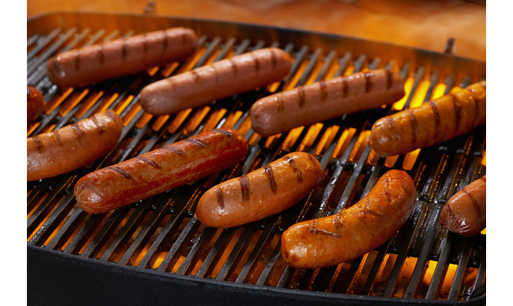 Hot Dogs and Sausages on Grill