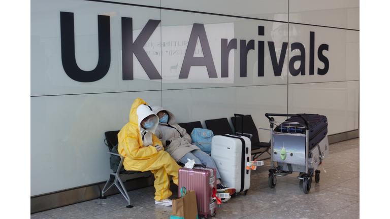 Passengers arriving in UK wearing protective clothing