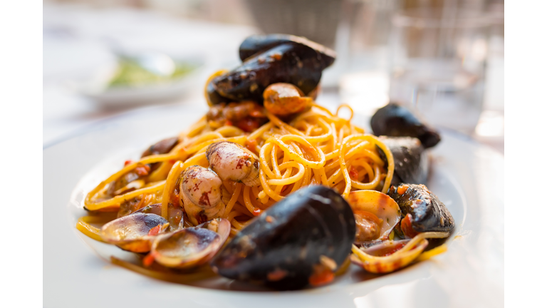 Italian pasta with seafood and herbs
