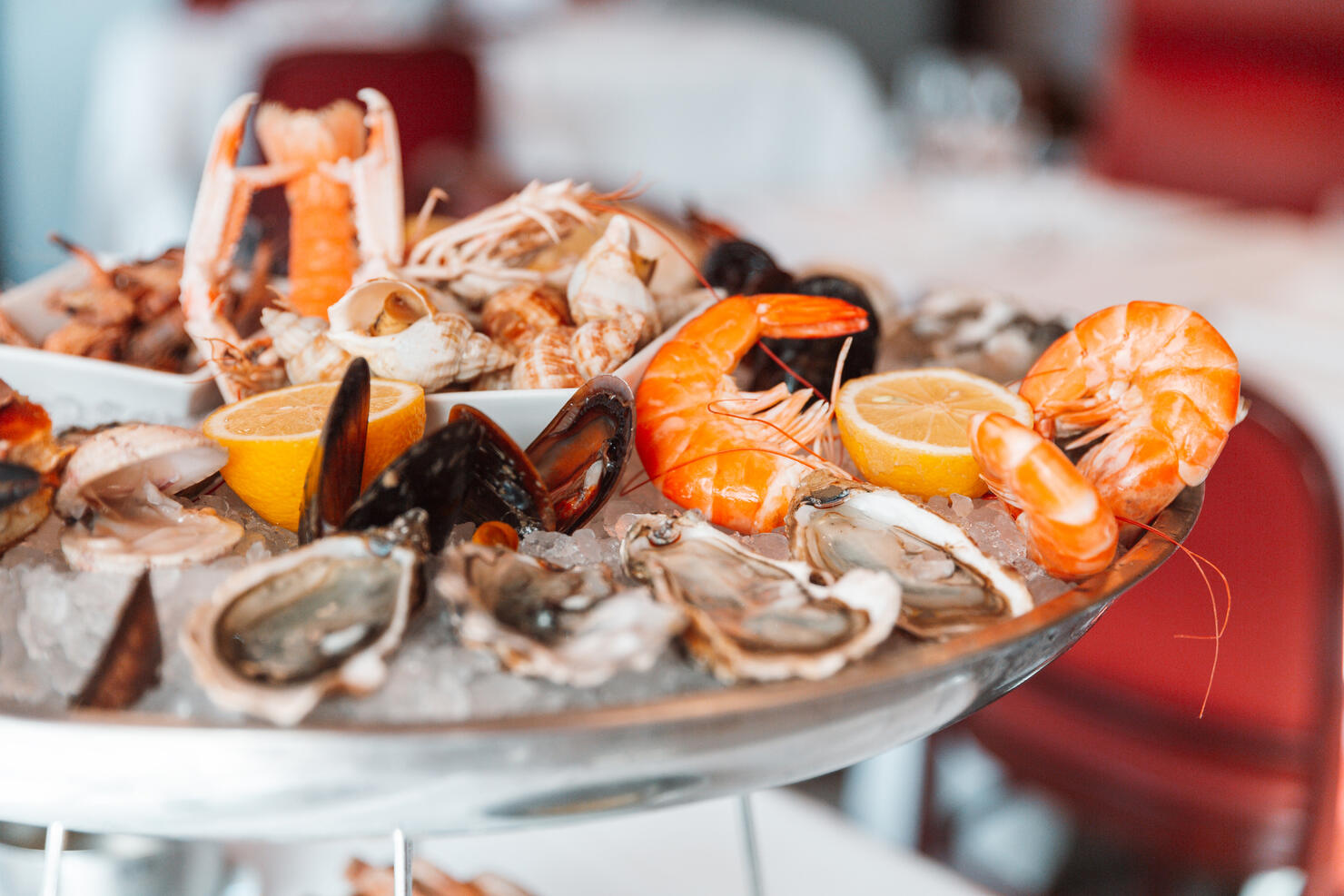 Close-up of a seafood platter with oysters and shrimps in a luxury restaurant