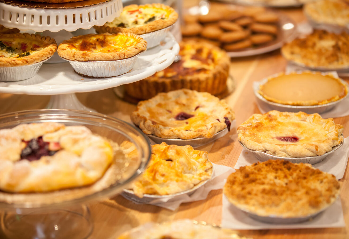 Bakery Counter Full of Assorted Pastries and Pies