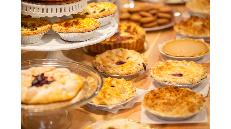 Bakery Counter Full of Assorted Pastries and Pies