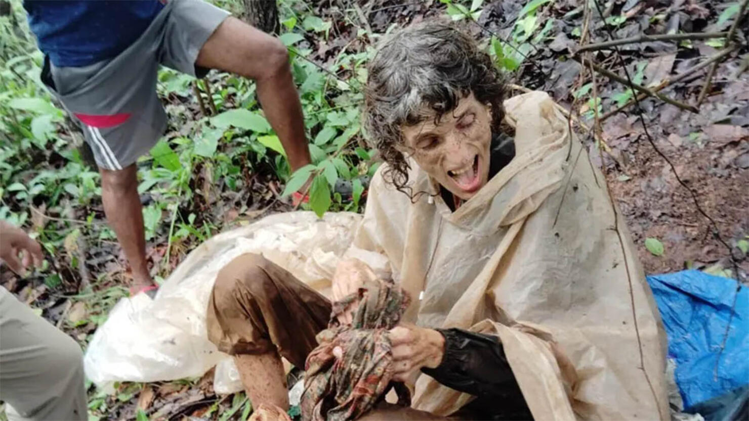 An American woman rescued after being found chained to a tree.