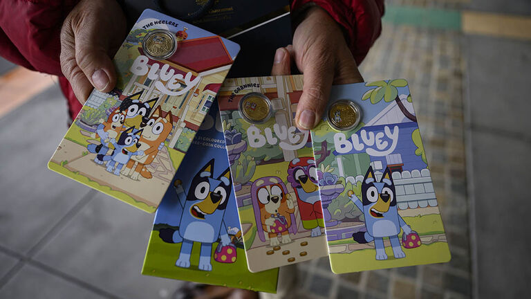 The complete set of Bluey commemorative coins