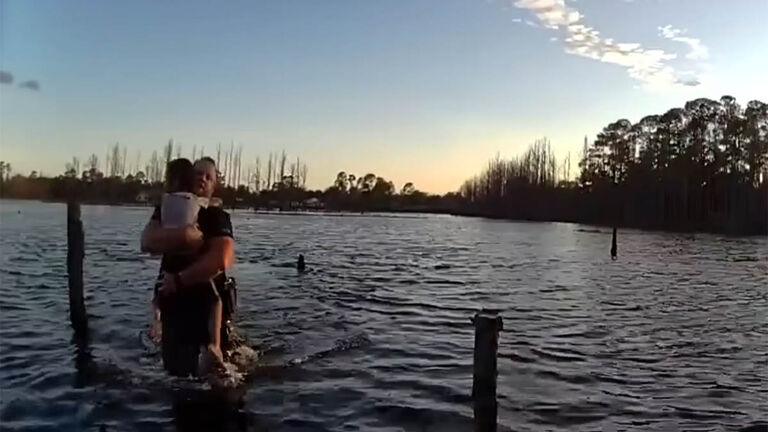 A deputy rescues a boy from a pond