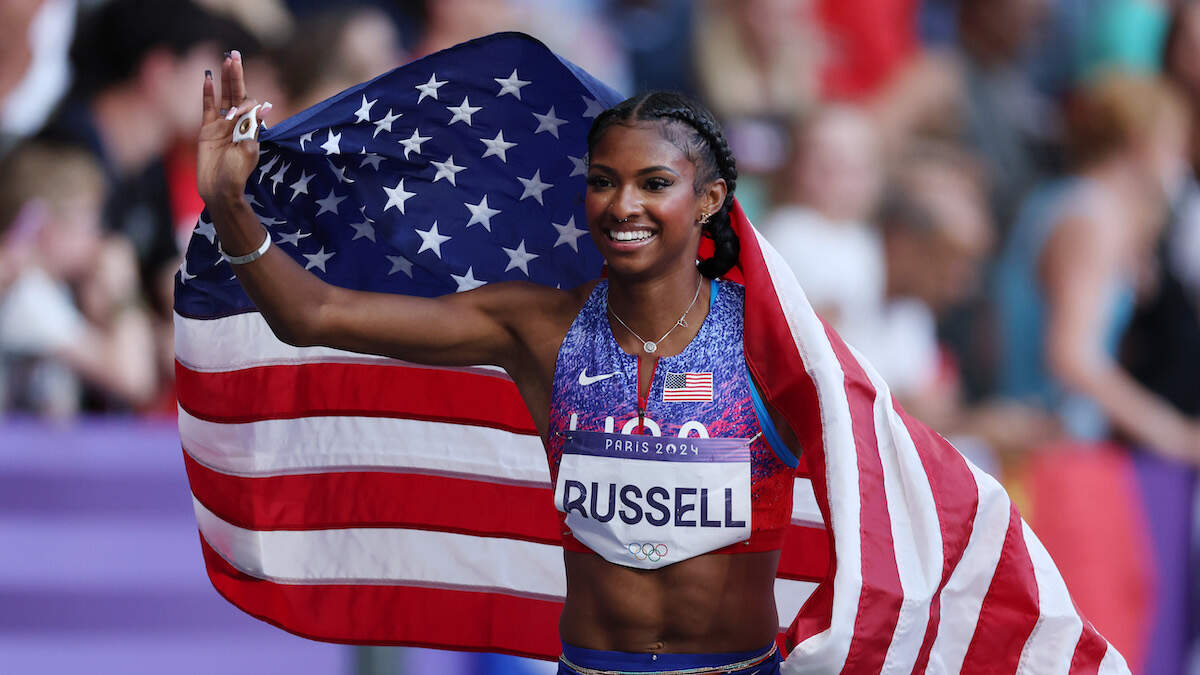 USA's Masai Russell Wins 100Meter Gold In Photo Finish 101one WJRR