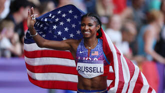 USA's Masai Russell Wins 100-Meter Gold In Photo Finish
